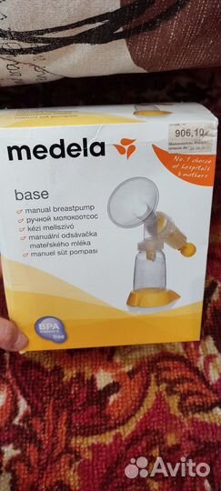 Молокоотсос medela ручной