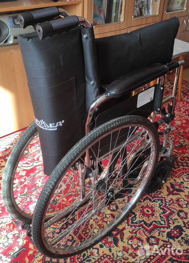 Инвалидная коляска
