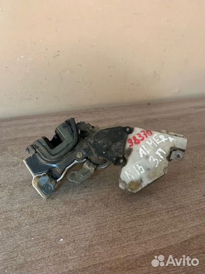 Замок задний правый Almera N15 Micra Sunny N14