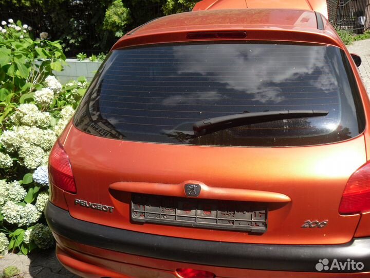 Двери Peugeot 206