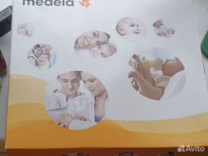 Молокоотсос medela электрический