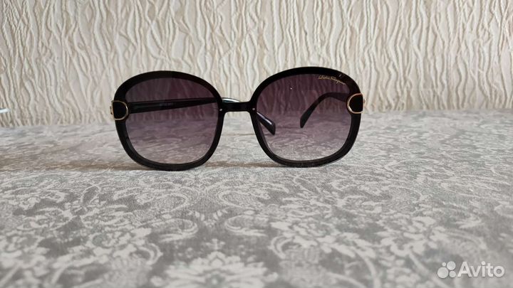 Солнцезащитные очки женские брендовые
