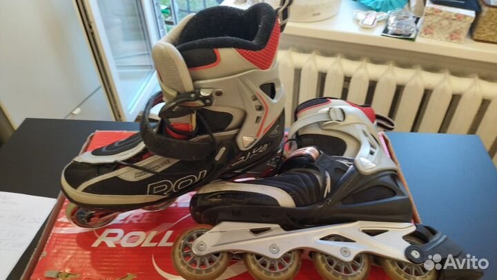 Роликовые коньки