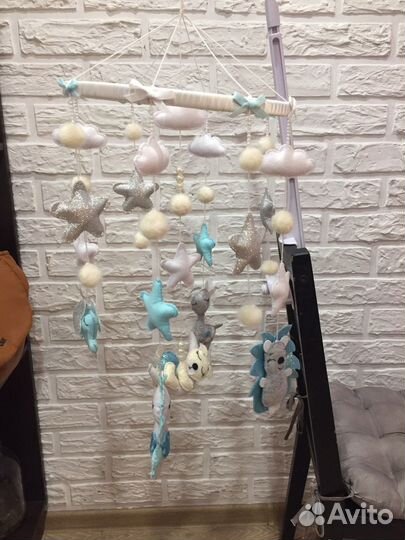 Музыкальный мобиль на кроватку