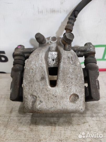 Суппорт задний правый Toyota Avensis T25 2AZ-FSE