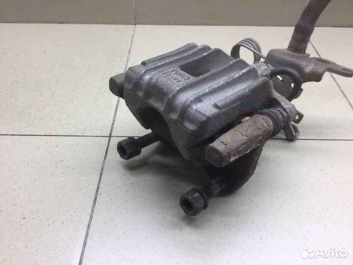 Суппорт тормозной задний задний правый Volkswagen