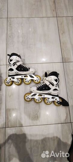 Роликовые коньки head