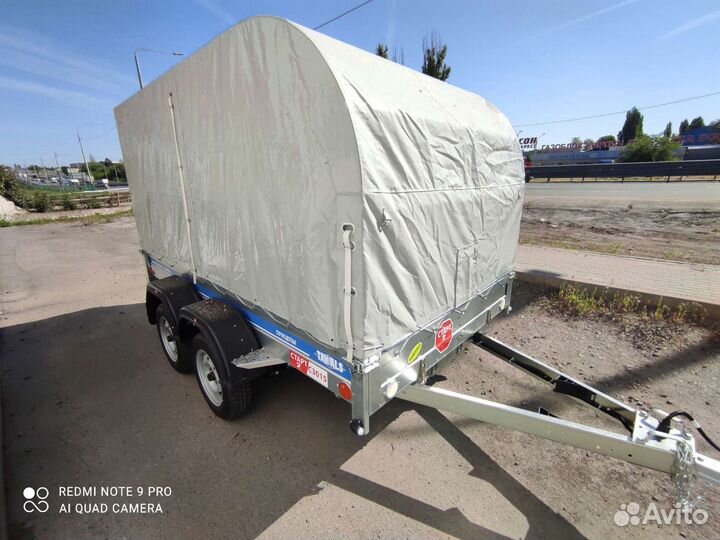 Двухосный легковой прицеп с тентом