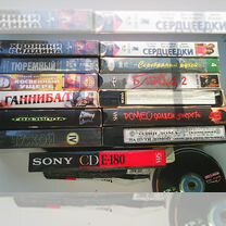 Видеокассеты и DVD диски с фильмами цена за всё