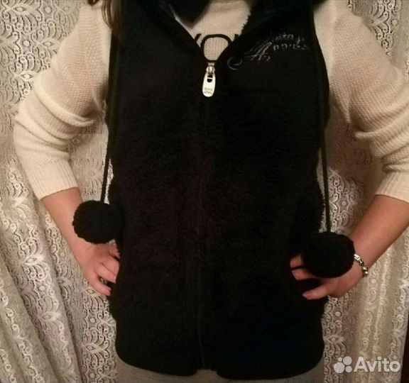 Меховая жилетка
