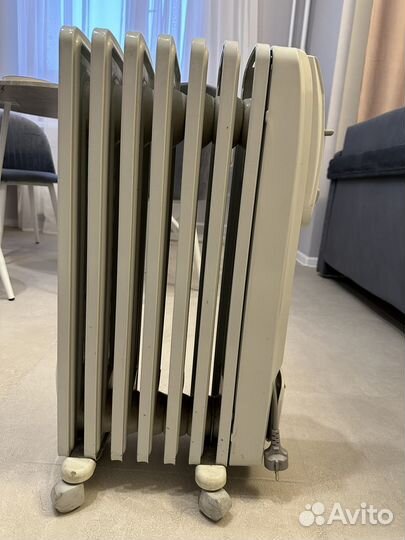 Масляный обогреватель Delonghi