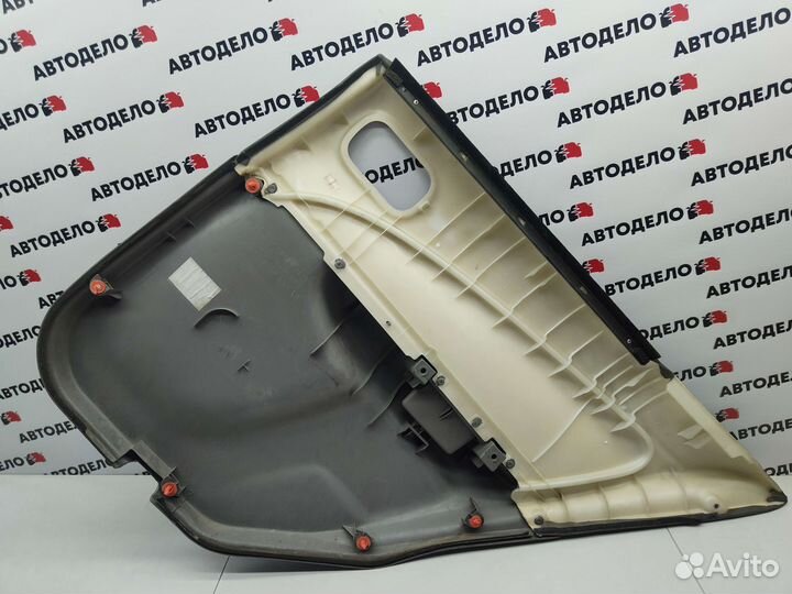 Обшивка двери задняя левая Nissan Sunny FB15 2000г