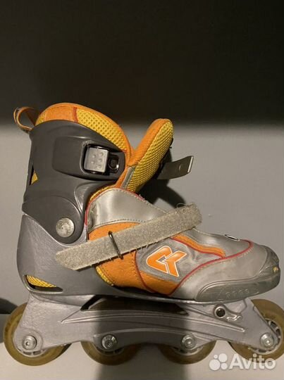 Роликовые коньки