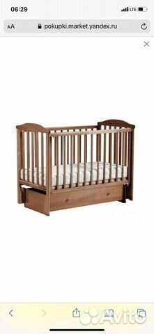 Детская кроватка с маятником и ящиком