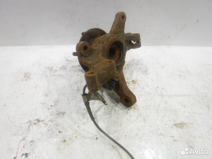 Кулак передний левый GA5R33030A