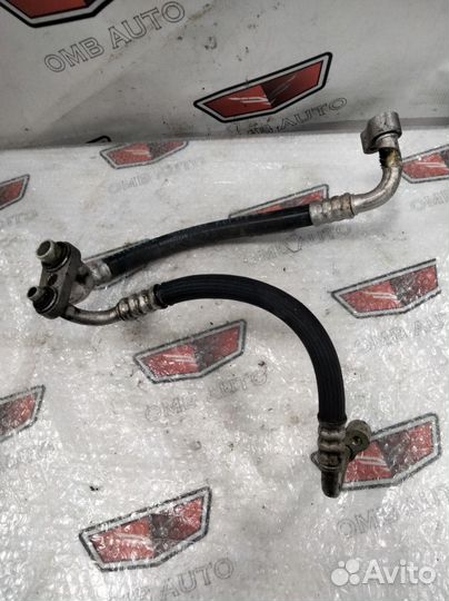 Трубка кондиционера Опель Астра Н Зафира Б