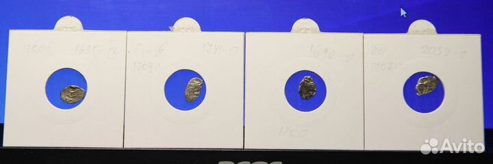 Серебряные монеты-чешуя Петра Первого