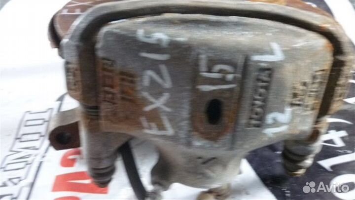 Суппорт передний левый Toyota Raum EXZ15 5E-FE