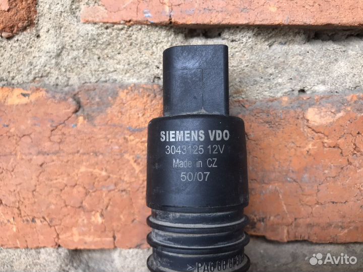 Моторчик бачка омывателя Mitsubishi Outlander XL