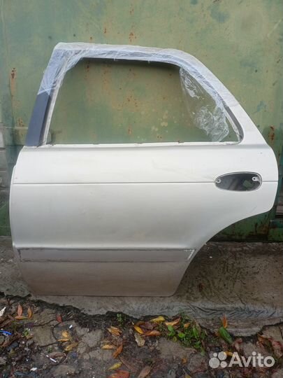 Дверь задняя левая kia sephia