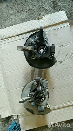 Кулак поворотный передний Митсубиси Лансер 10