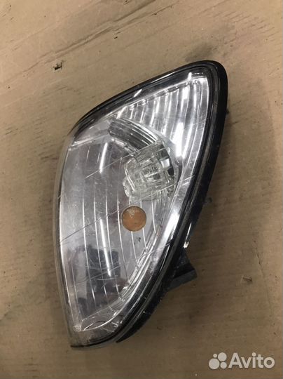 Поворотник передний левый Toyota land Cruiser 100