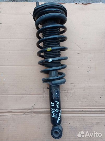 Амортизатор перед Nissan Laurel GHC-35 97-02г