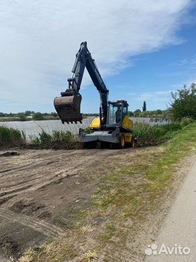 Экскаватор колесный volvo