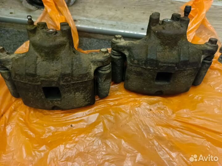 Передние суппорта Mitsubishi lancer 10