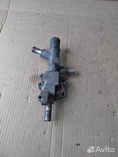 Фланец системы охлаждения Mazda 626 GF 1997-2002