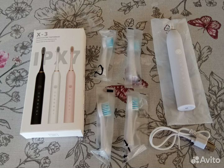 Электронная зубная щетка