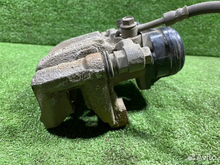 Суппорт задний левый Kia K5 с 2020