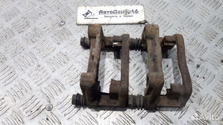 Скоба заднего суппорта Opel Astra H