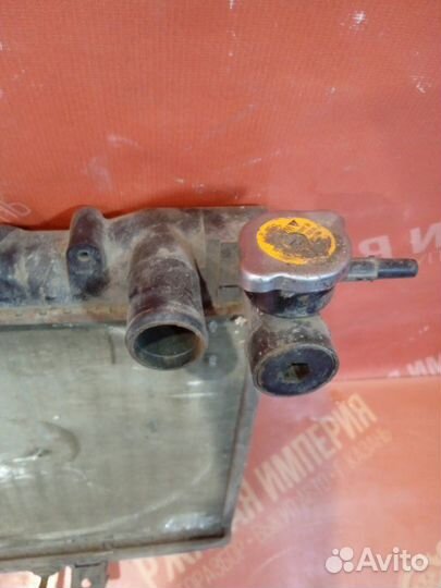 Диффузор вентилятор передний Nissan Presea R11