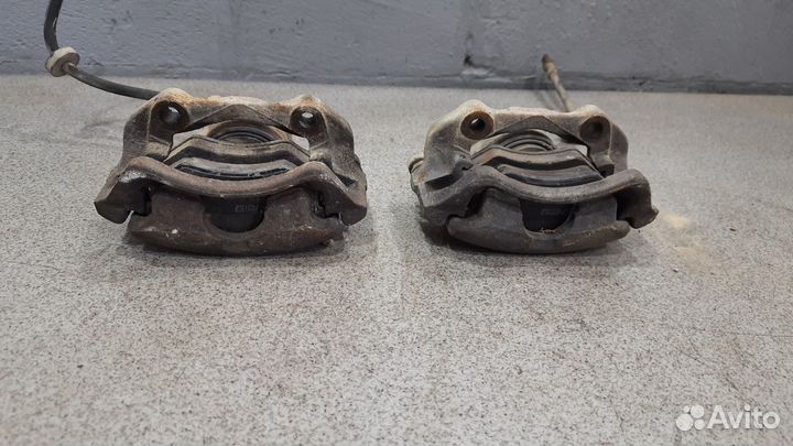 Передний тормозной суппорт WV Passat b4 B3