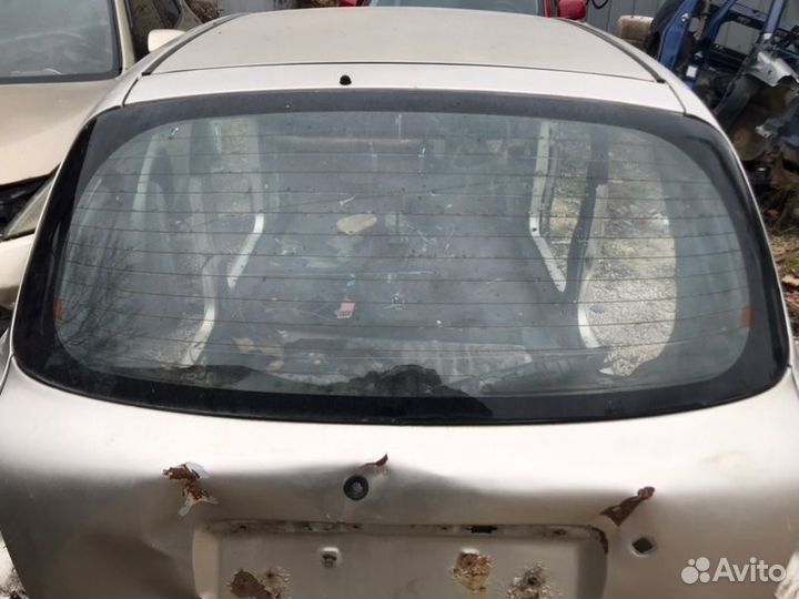 Стекло заднее Toyota Duet M100A EJ 1999
