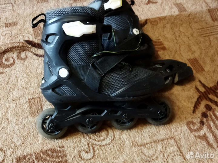 Роликовые коньки