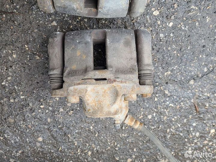 Суппорт тормозной передний renault logan