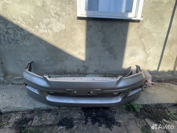 Бампер передний mitsubishi lancer cedia