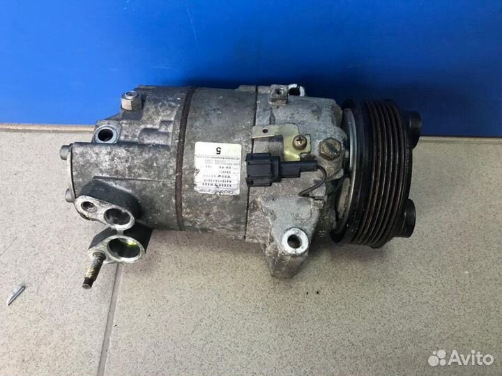 Компрессор кондиционера на наиссан Bluebird
