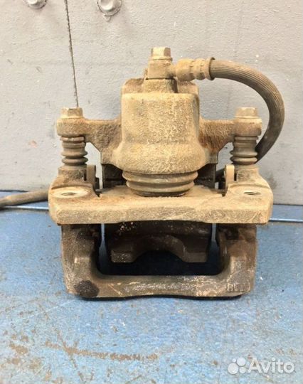 Суппорт задний левый Mazda Cx-7 ER