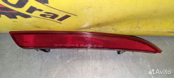 Отражатель в бампер задний правый Opel Astra J