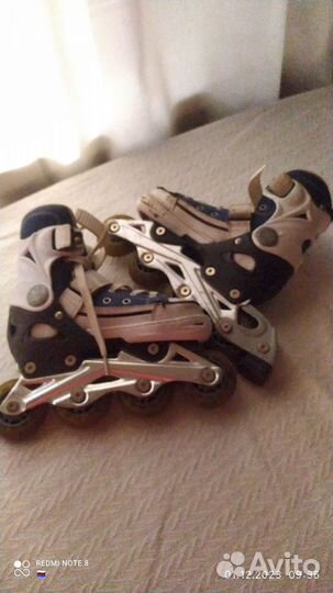 Коньки роликовые