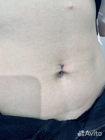 Мастер по пирсингу