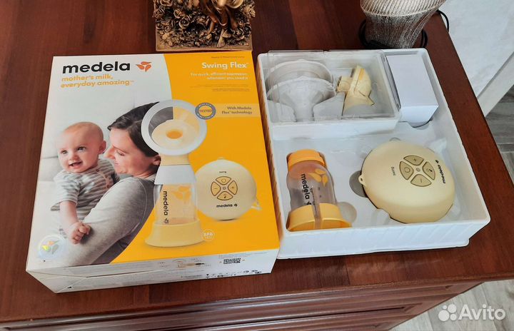 Молокоотсос medela электрический