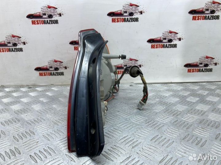 Фонарь задний задний левый Kia Spectra седан S6D