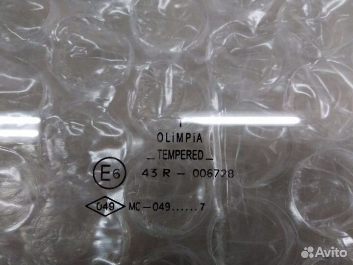 Стекло двери переднее левое Ford Escort Iv