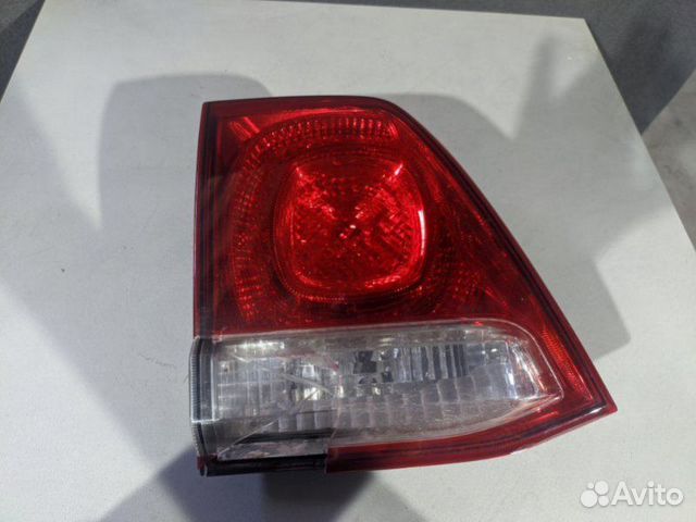 Фонарь в крышку багажника задний левый Toyota Land