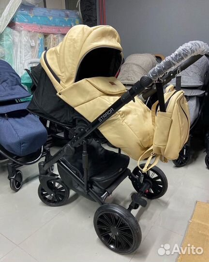 Коляска из экокожи 2 в 1
