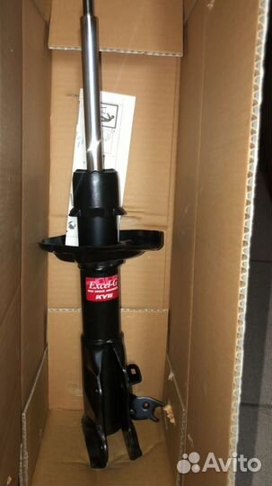 KYB Стойка амортизационная газовая, передняя левая